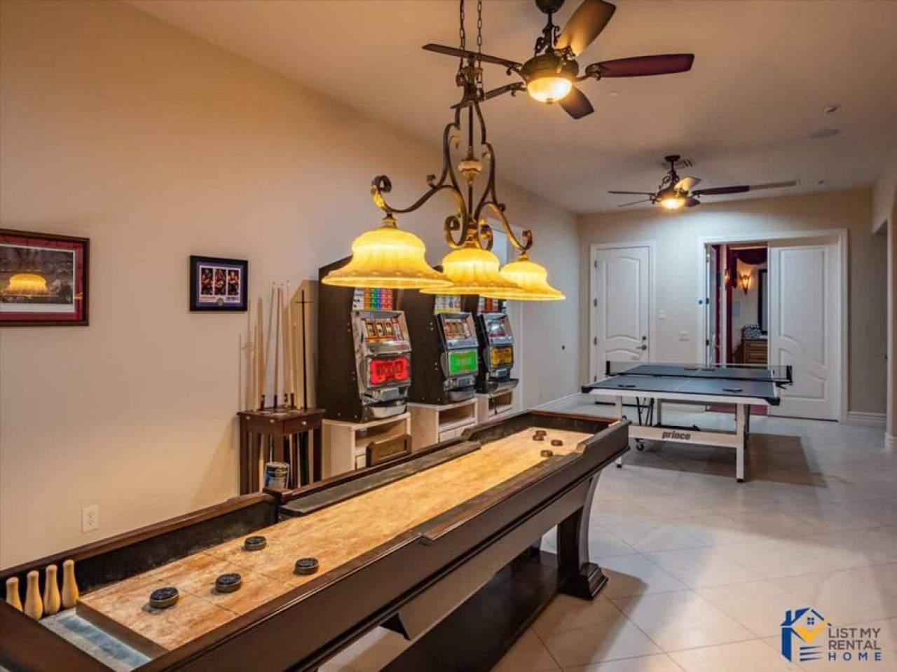 Your private game room awaits with shuffleboard, ping pong, and slot machines for endless entertainment during your stay.
