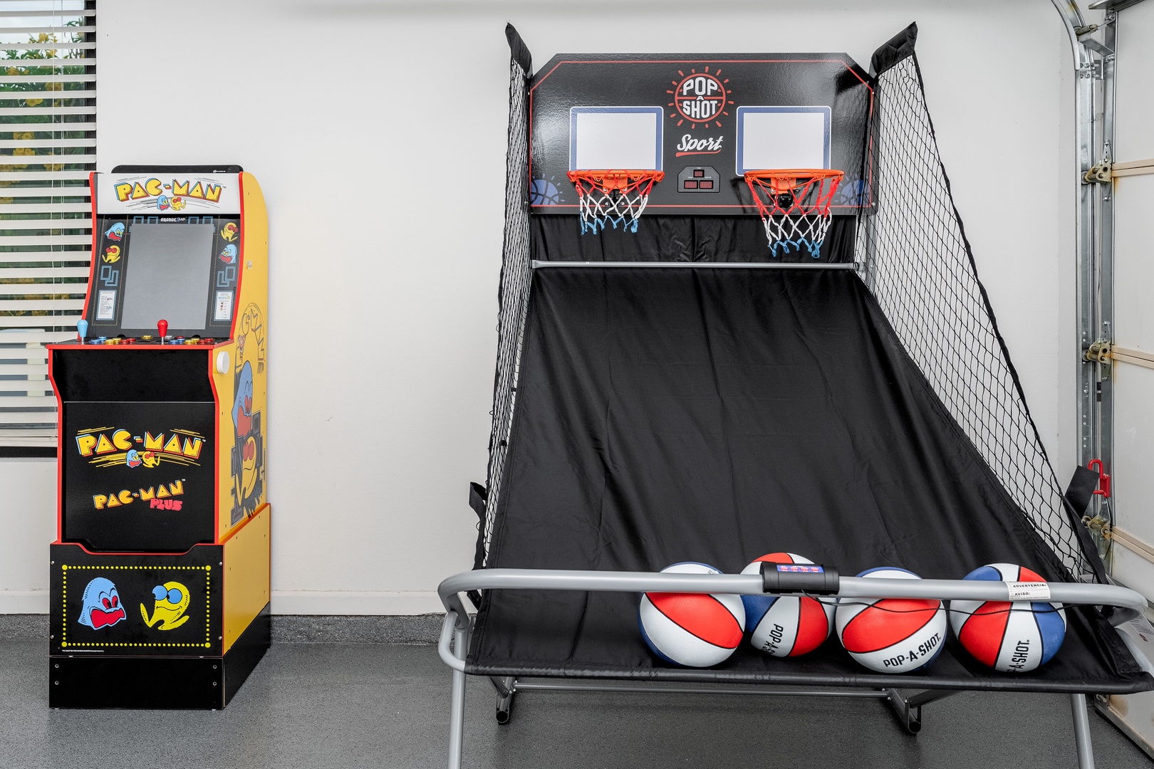 Challenge your friends to a friendly game of Pop-A-Shot basketball or relive classic arcade nostalgia with Pac-Man—your fun-filled game room awaits.