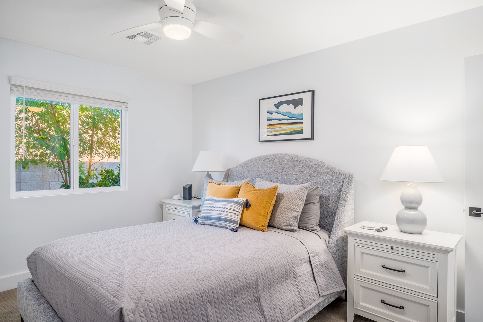 Sink into plush bedding and wake to peaceful garden views framing your window. Your serene bedroom retreat awaits, with thoughtful touches that make you feel right at home.