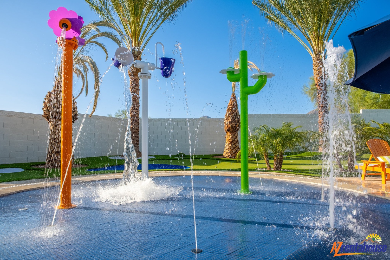 Splash into fun at this colorful aqua park with exciting water features, perfect for creating joyful family memories under sunny skies.