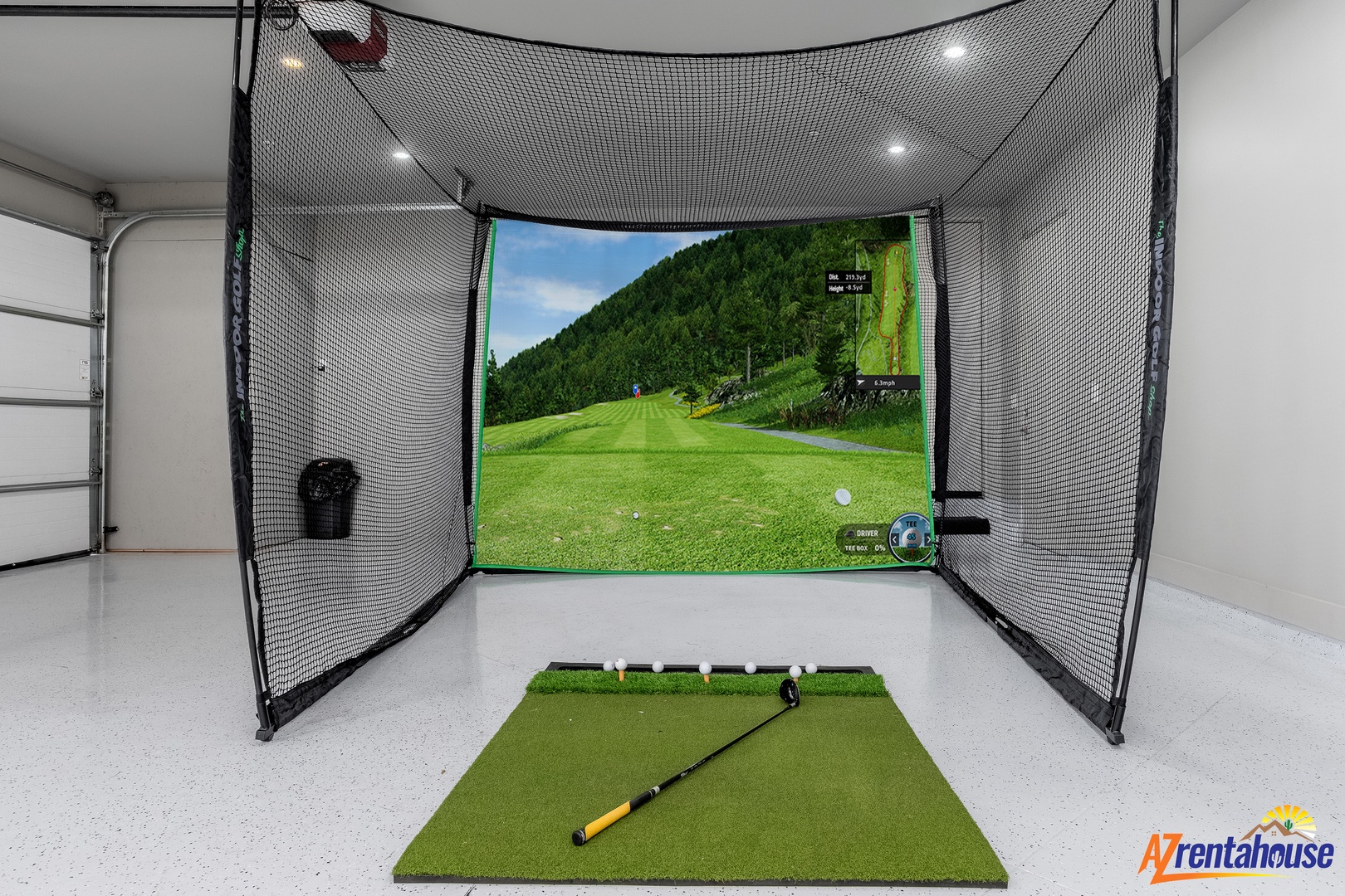 Practice your swing in your private golf simulator, complete with professional netting and scenic virtual courses for year-round play.