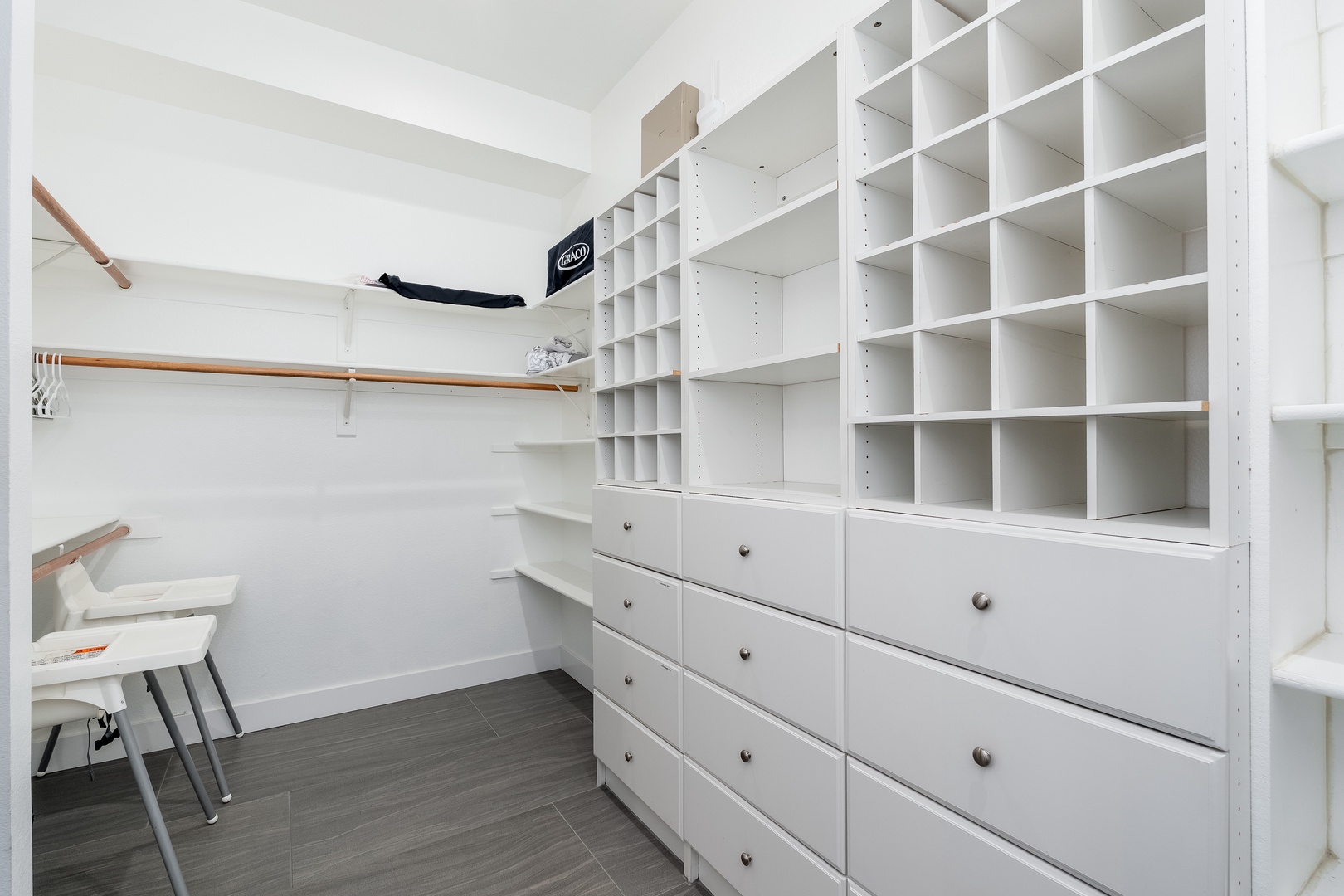 Your own spacious walk-in closet offers custom shelving, drawers, and hanging space to keep everything organized and within easy reach during your stay.