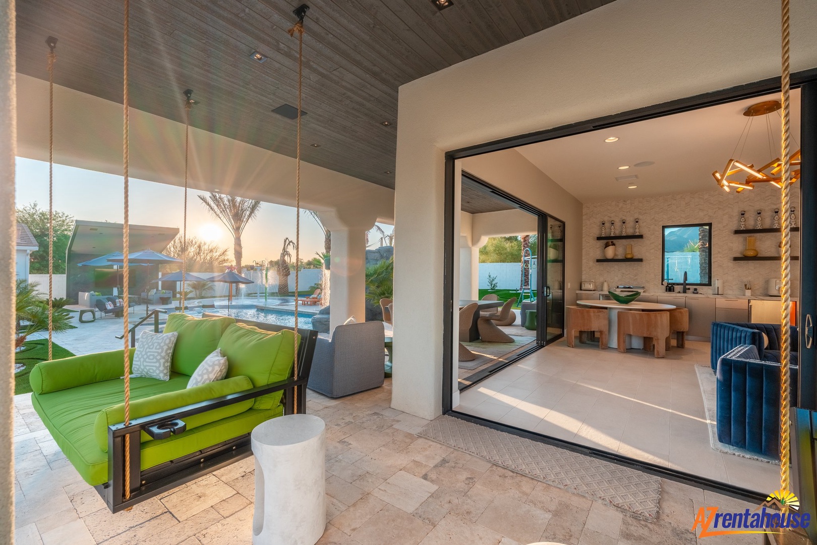 Swing into relaxation on your private covered patio, where indoor-outdoor living flows seamlessly through sliding glass doors to your modern kitchen.