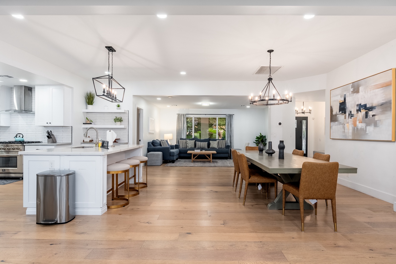 Step into your bright, open living space where modern farmhouse charm meets effortless elegance—perfect for gathering around the dining table or relaxing in your stylish living room.