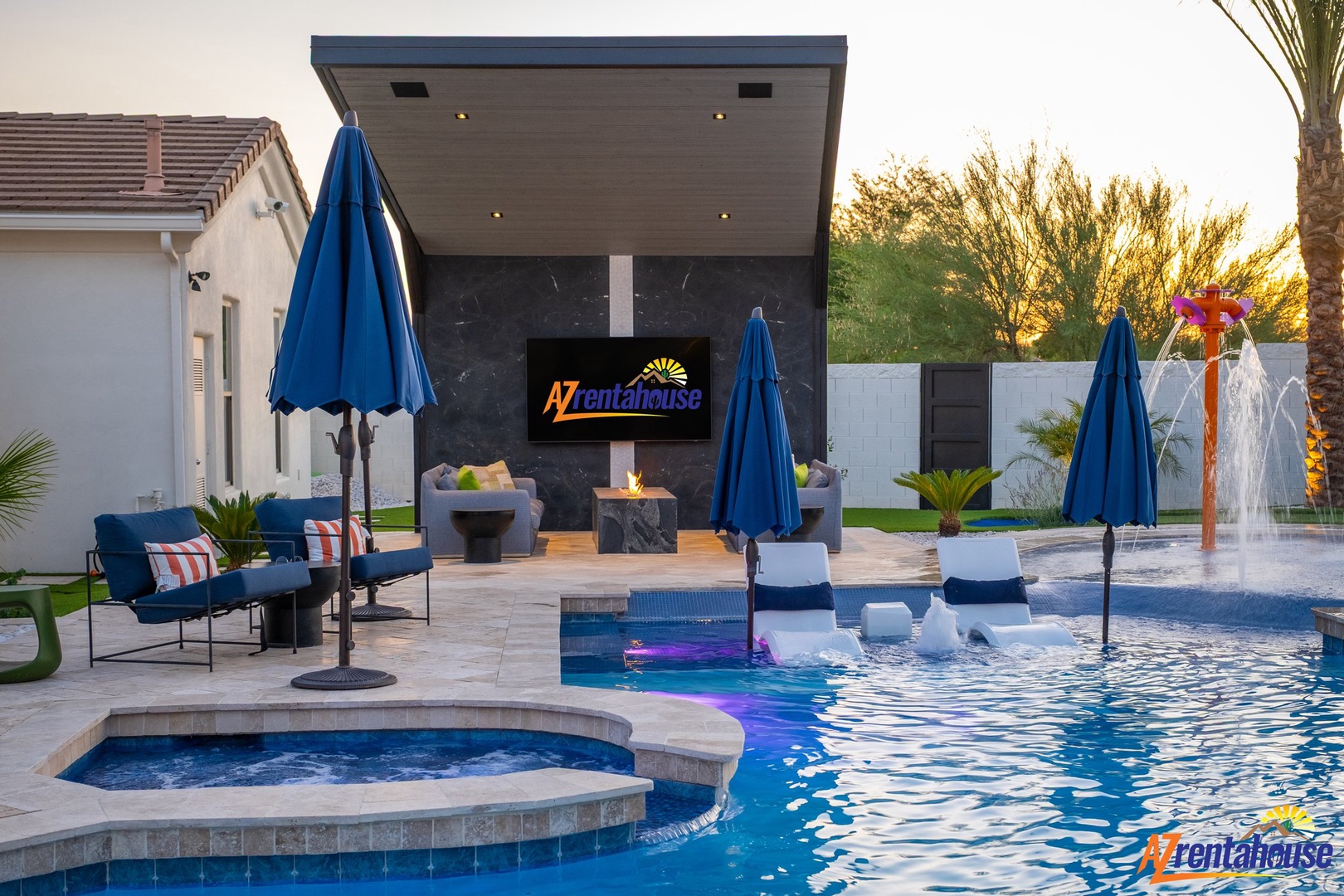 Dive into your private oasis with sparkling pool, soothing hot tub, and poolside lounge chairs under shade umbrellas for ultimate relaxation.