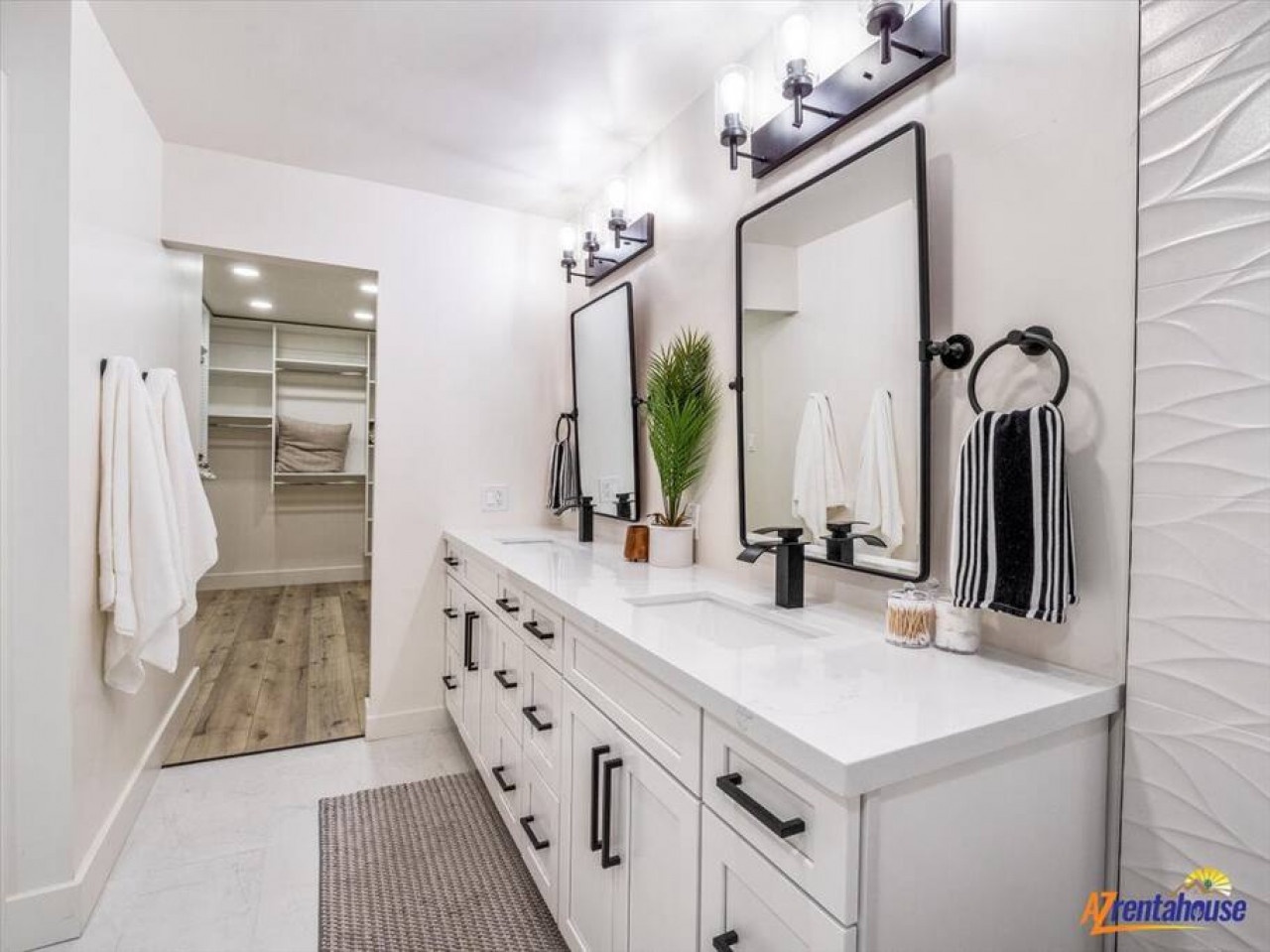 Step into your spa-like bathroom with dual vanities, premium fixtures, and a spacious walk-in shower for ultimate comfort.