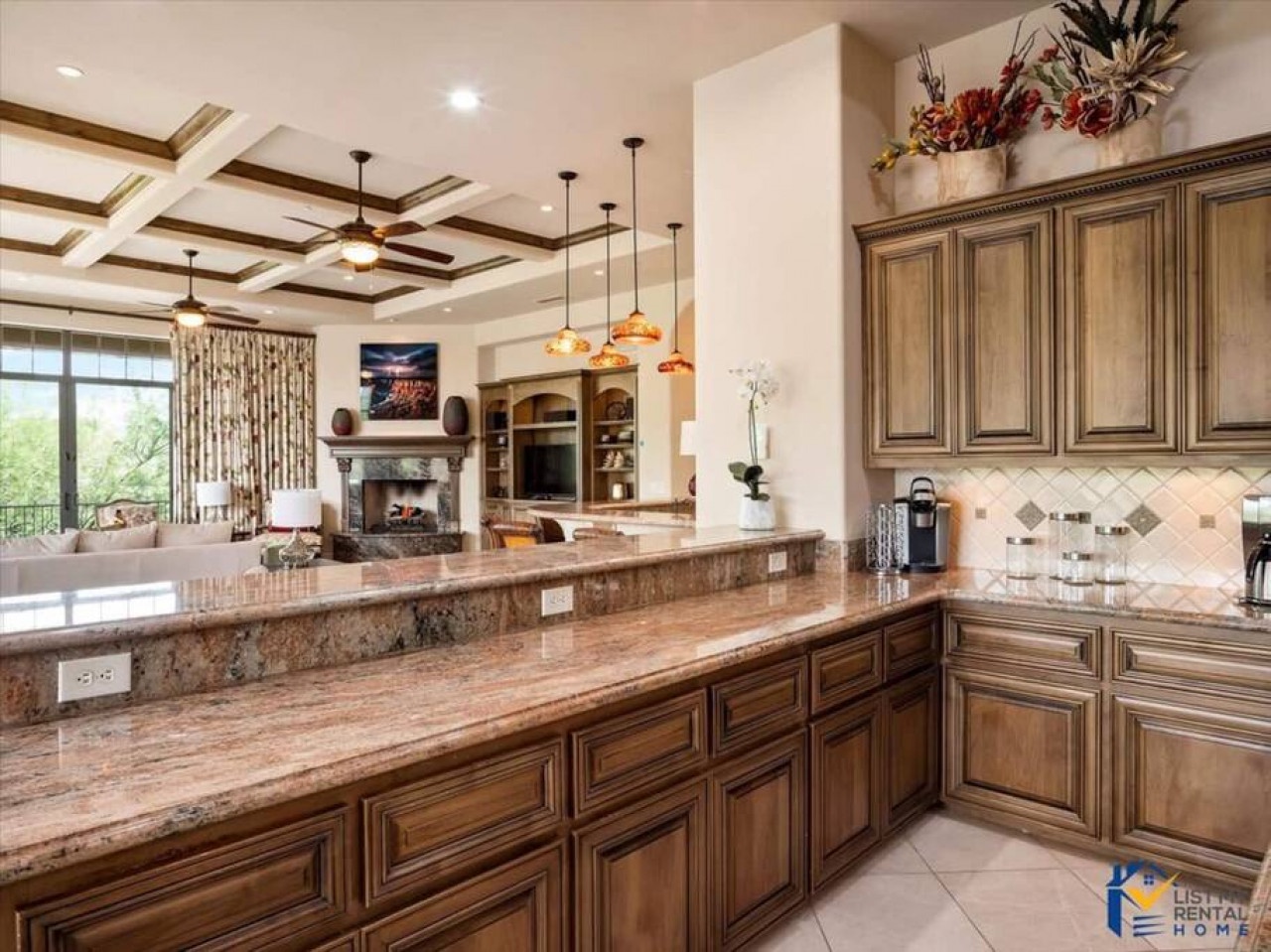 Your gourmet kitchen features granite countertops, custom cabinetry, and elegant pendant lighting for memorable meal preparation.