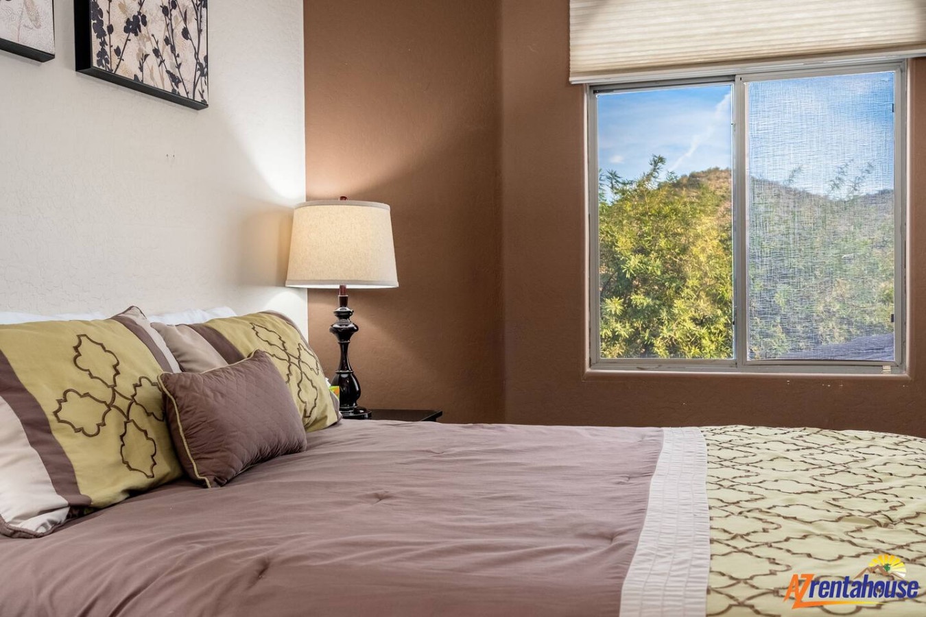 Sink into this comfortable bed with mountain views streaming through your window, creating the perfect peaceful retreat.