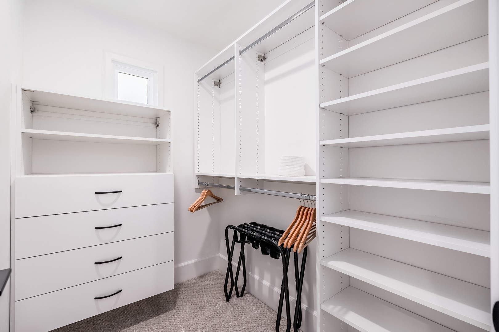 Your spacious walk-in closet offers custom shelving and hanging space, making unpacking and organizing your vacation wardrobe a breeze. Plenty of room to settle in!
