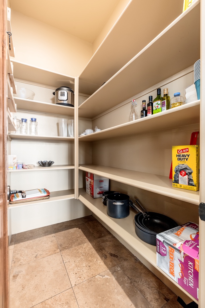 Your personal pantry with ample shelving keeps all your cooking essentials and snacks neatly organized, making meal prep effortless and stress-free during your stay.