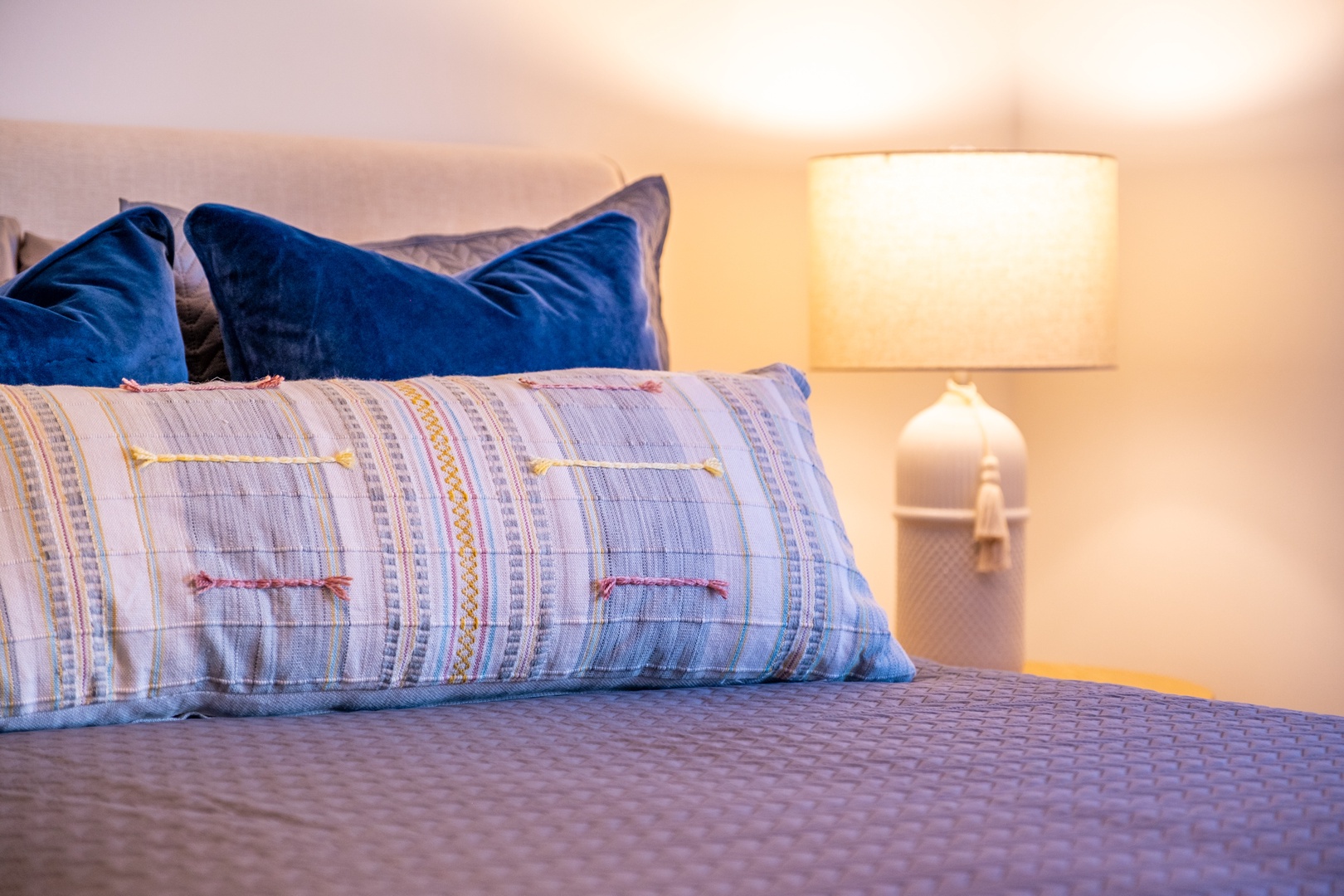 Sink into plush pillows and luxurious bedding after your day of adventure. The soft glow from your bedside lamp creates the perfect ambiance for unwinding.