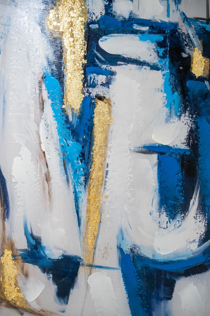 Abstract art adds modern sophistication and vibrant personality to your living space, with textured brushstrokes creating visual interest.