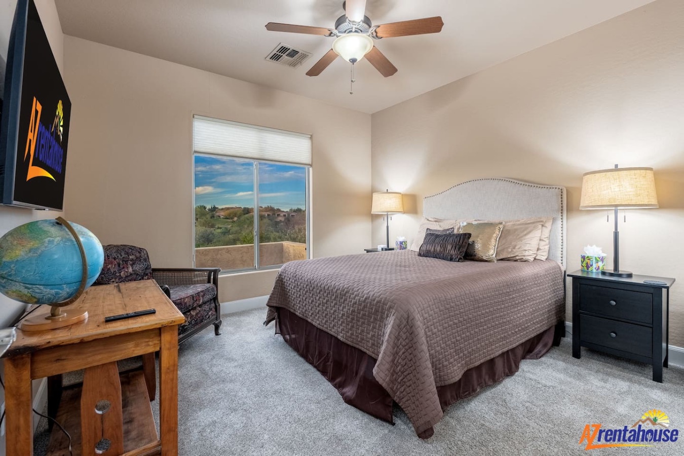 Rest in this comfortable bedroom with plush bedding and wake up to beautiful desert views through your window.