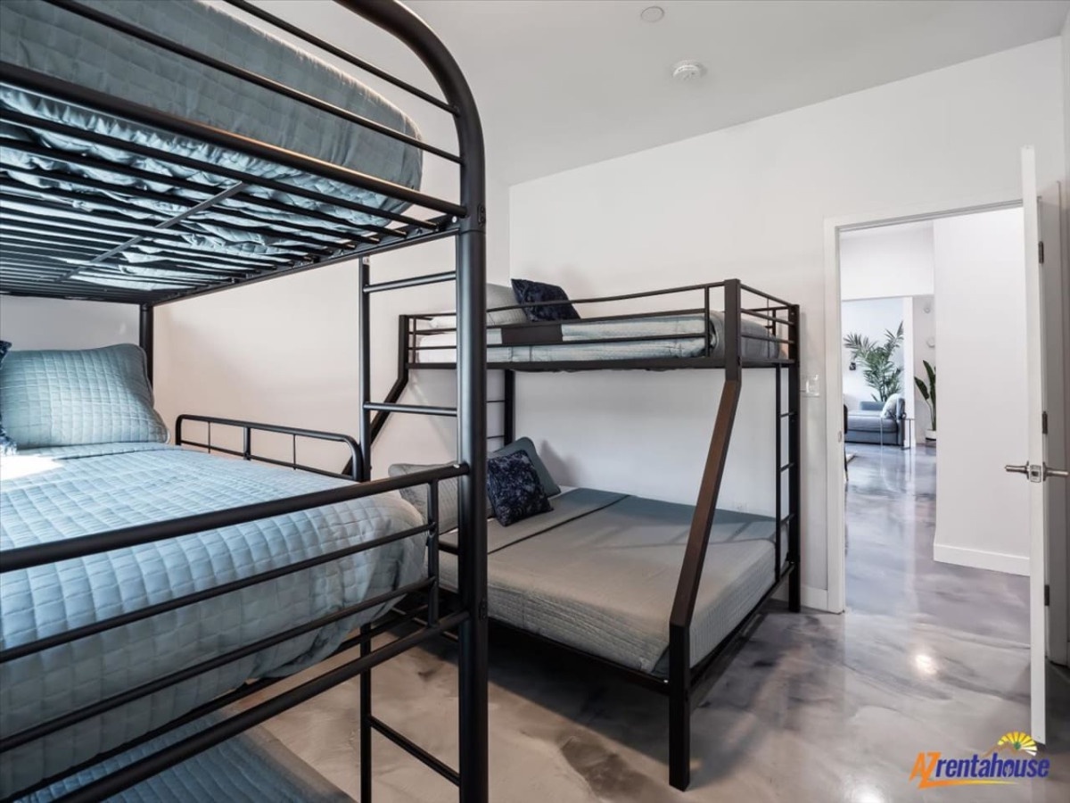 Your comfortable bunk room sleeps four with premium mattresses and individual reading lights for cozy nights.