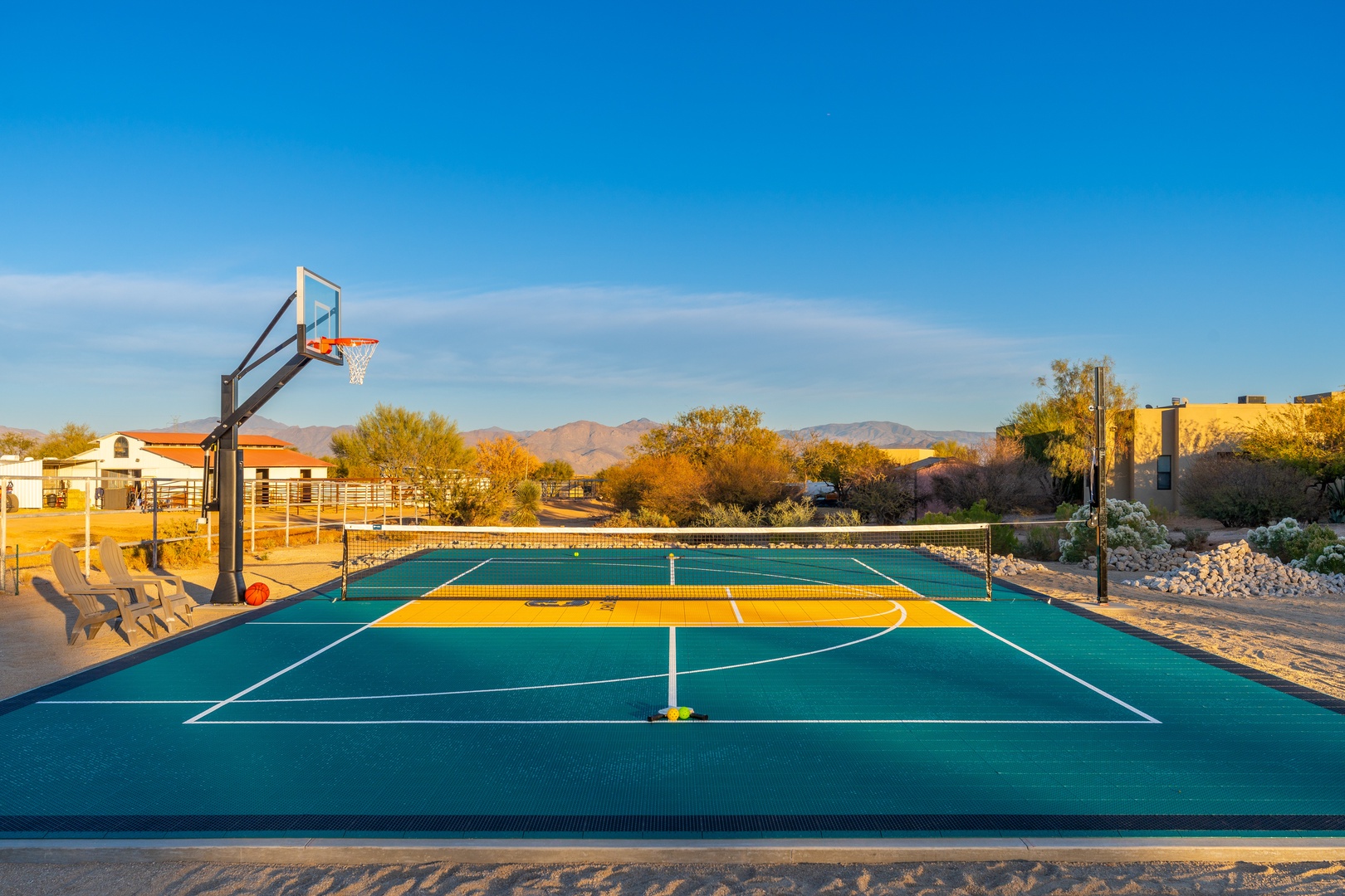 A private multi-sport court with mountain views offers endless opportunities for friendly games under the desert sun. Perfect for shooting hoops, volleyball, or pickleball.