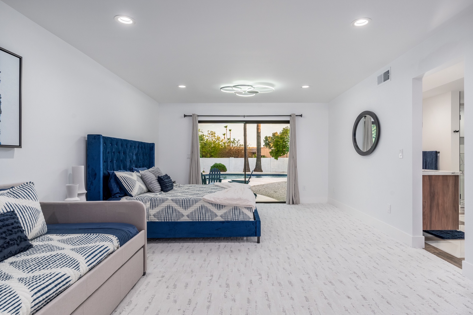 Sink into your plush bed with garden views right from your window, or unwind on the extra sleeping sofa. Your en-suite awaits just steps away for ultimate convenience.