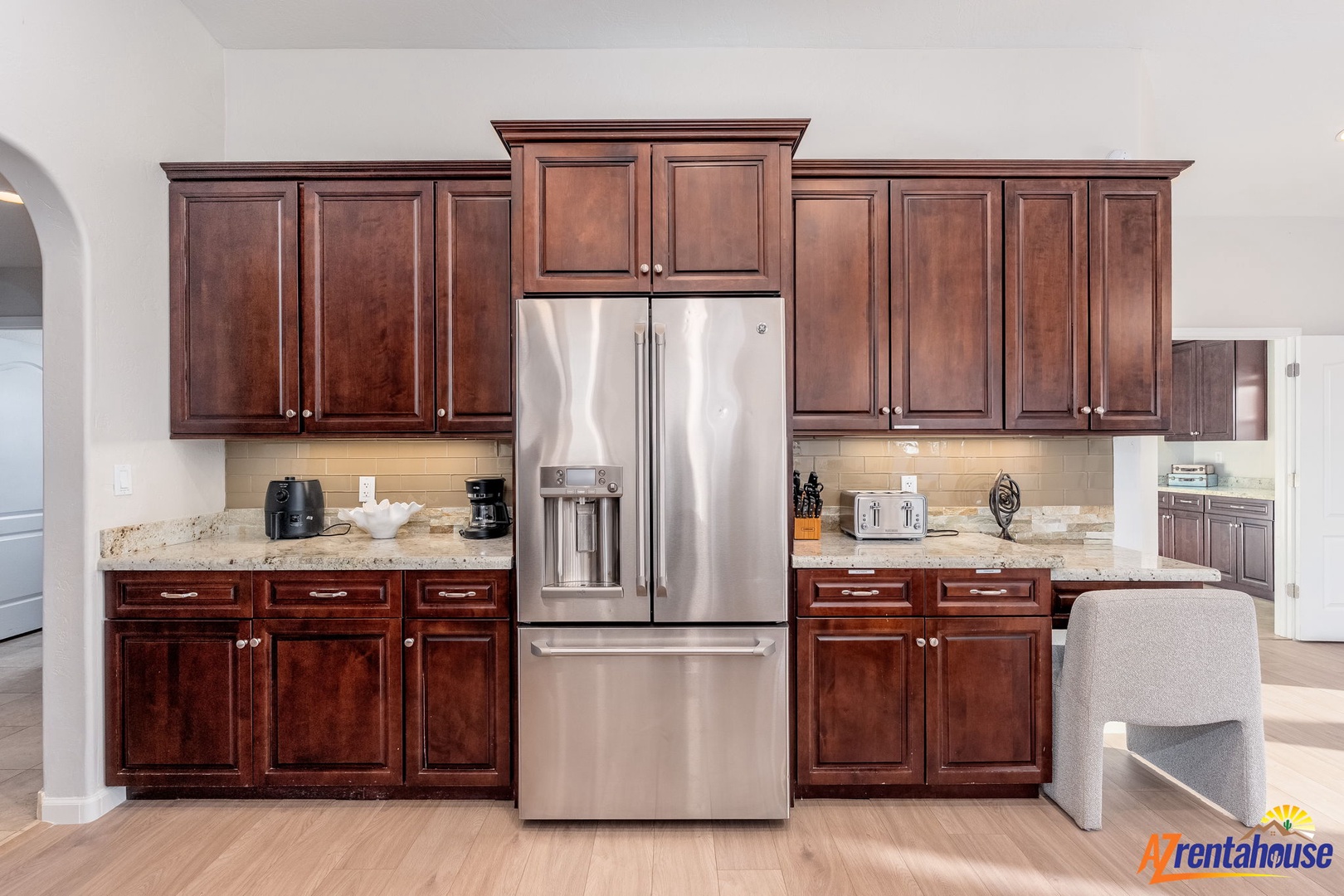Picture yourself brewing morning coffee in your fully equipped kitchen, with gleaming granite counters, rich cherry cabinets, and stainless steel appliances ready for your culinary adventures.