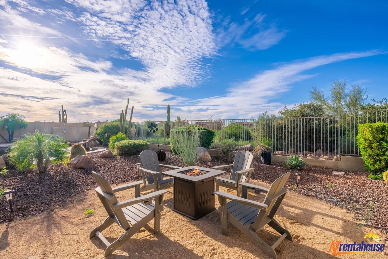 Gather around your private fire pit as desert sunsets paint the sky, creating perfect moments for evening conversations under Arizona stars.