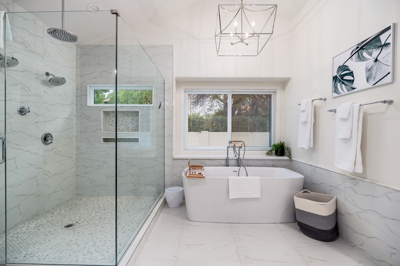 Unwind in your serene spa-inspired bathroom, where a soaking tub and spacious walk-in shower invite pure relaxation after a day of exploring.