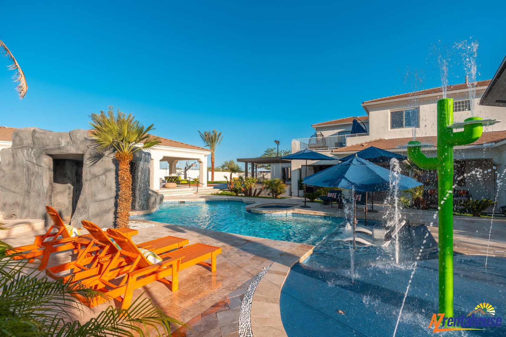 Dive into your private oasis with sparkling pools, fun water features, and sunny loungers under swaying palms.