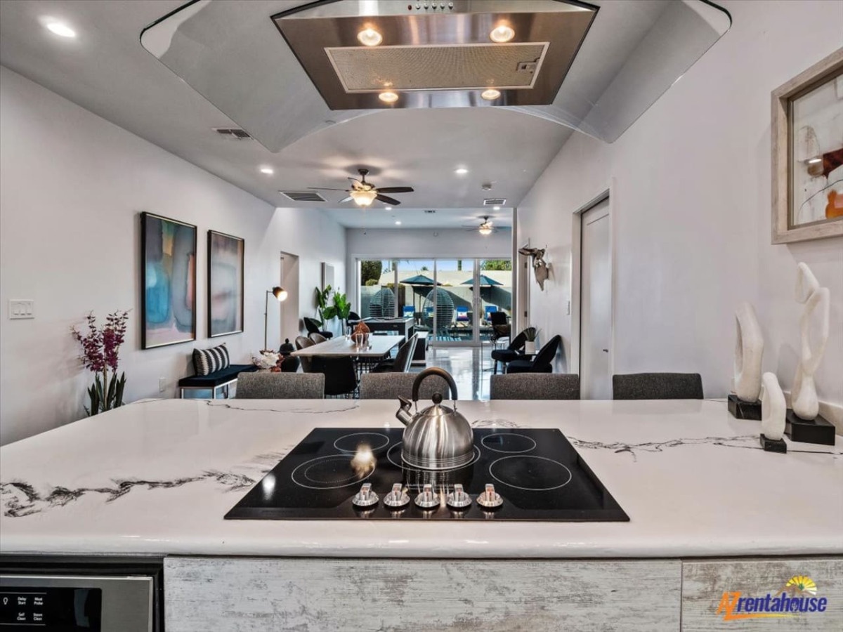 Cook your favorite meals on sleek marble counters with modern appliances flowing into your bright, open living space.