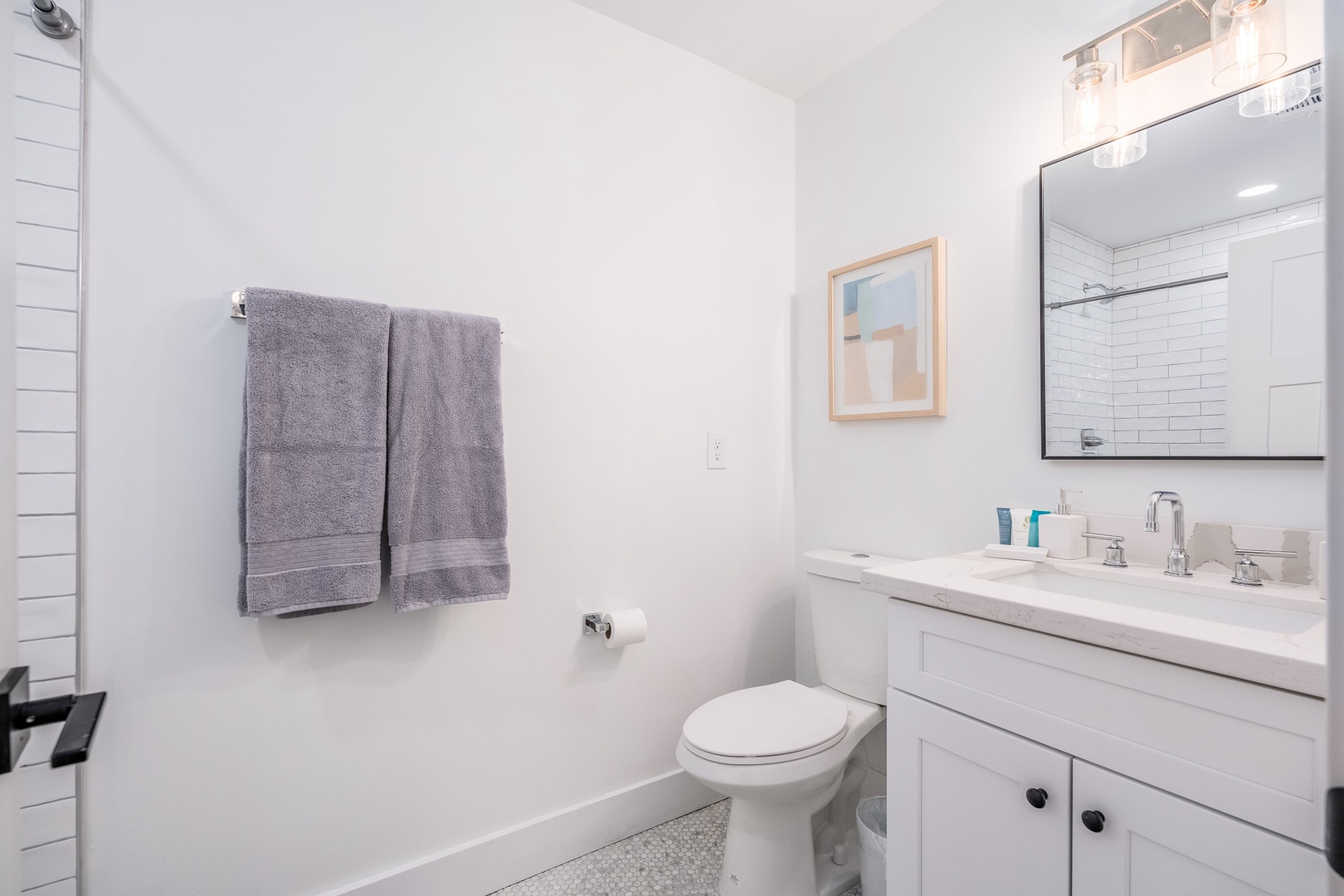 Freshen up in your bright, beautifully updated bathroom with modern fixtures, a spacious vanity, and a sparkling tiled shower—perfect for unwinding after a day of adventure.