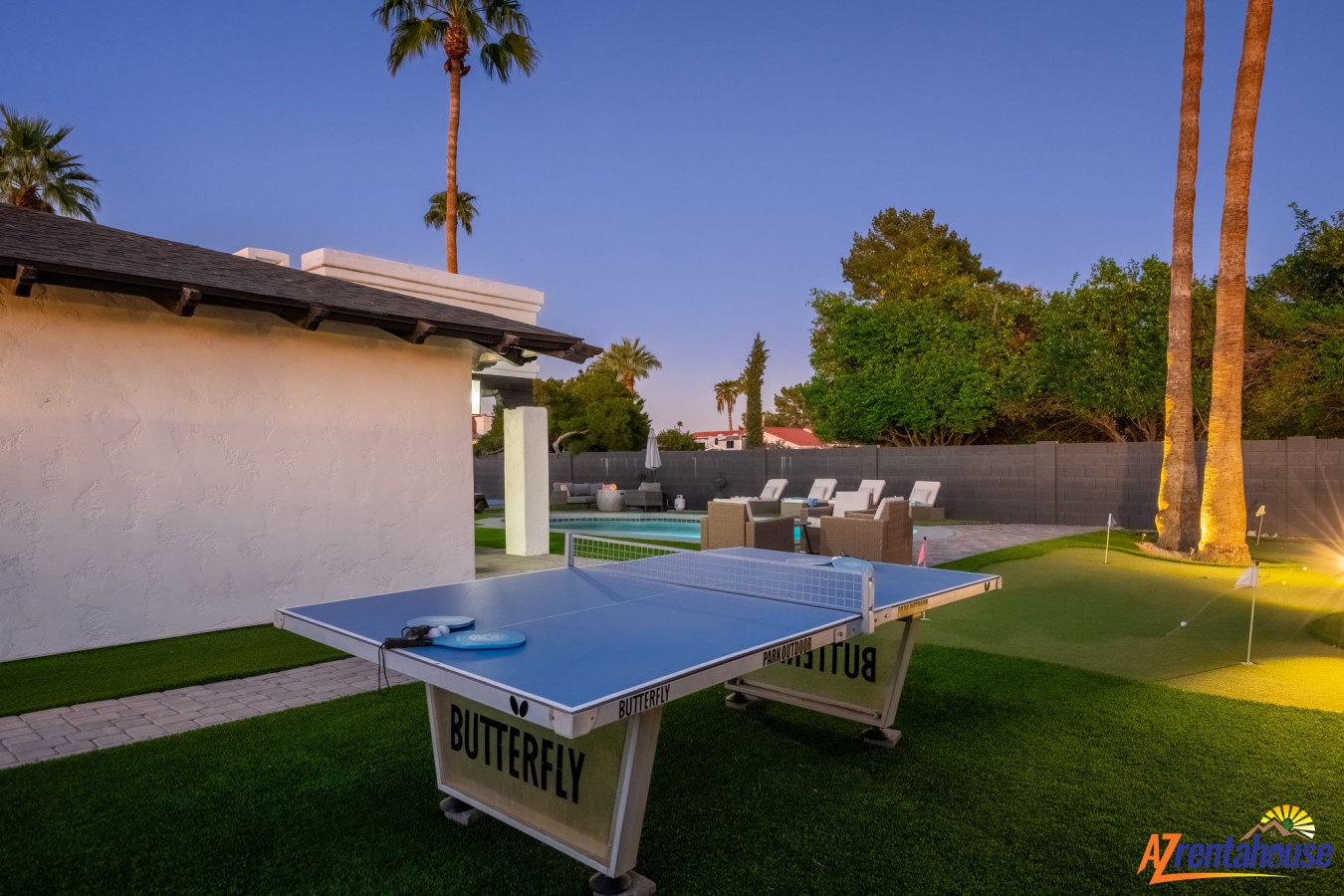 Your private backyard oasis awaits with ping pong competitions under starlit desert palms, steps from the sparkling pool.