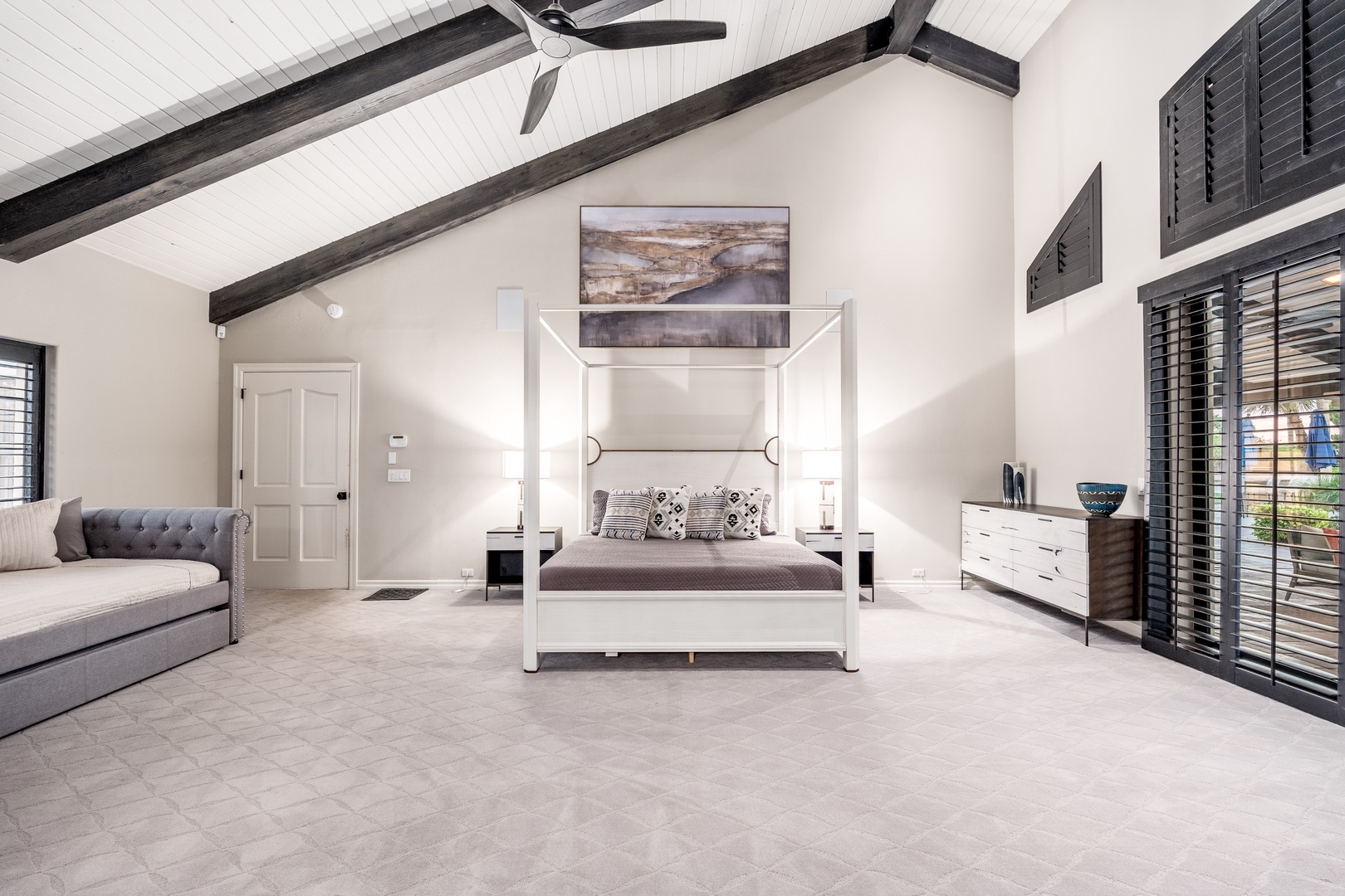 Step into your spacious retreat with vaulted ceilings, elegant furnishings, and a cozy seating area—perfect for unwinding after a day of adventure.