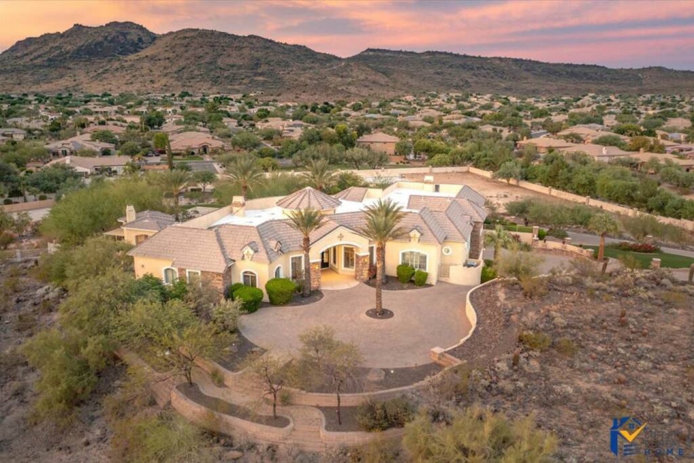 Stunning desert estate nestled in Arizona's mountainous landscape, offering expansive views and luxurious privacy in nature's embrace.