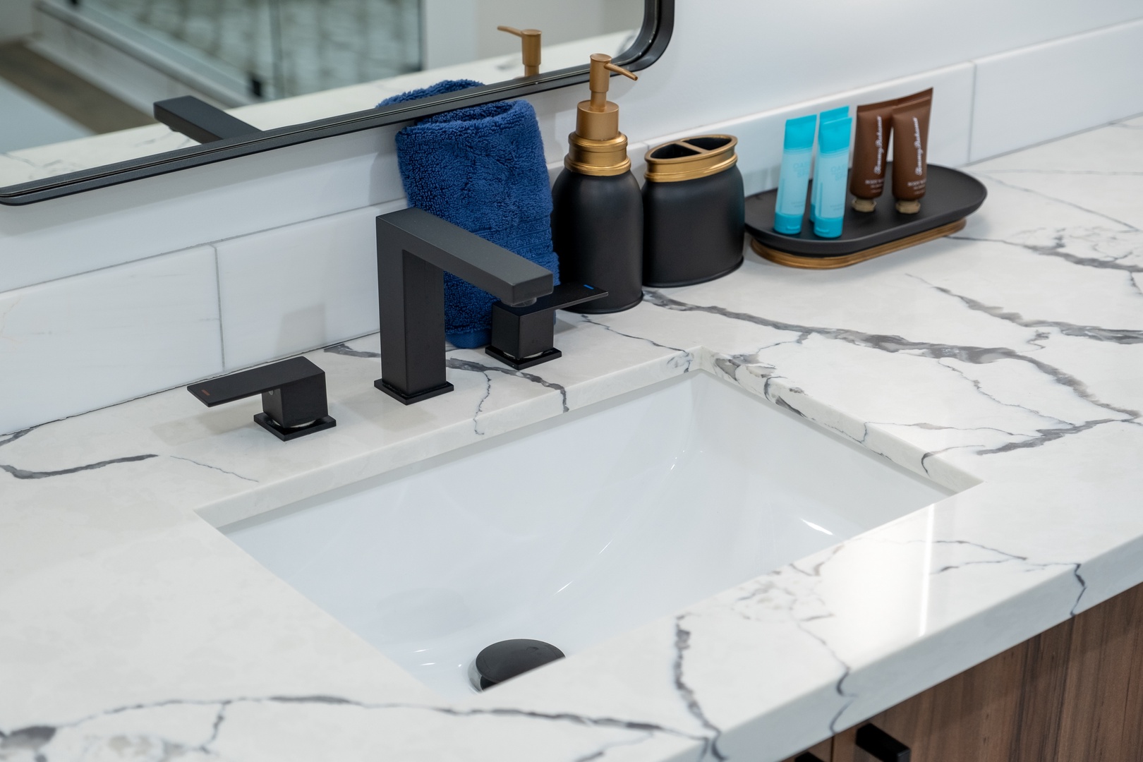 Relax in your private bathroom with modern fixtures, luxury toiletries, and plush towels—everything you need to feel pampered and refreshed during your stay.