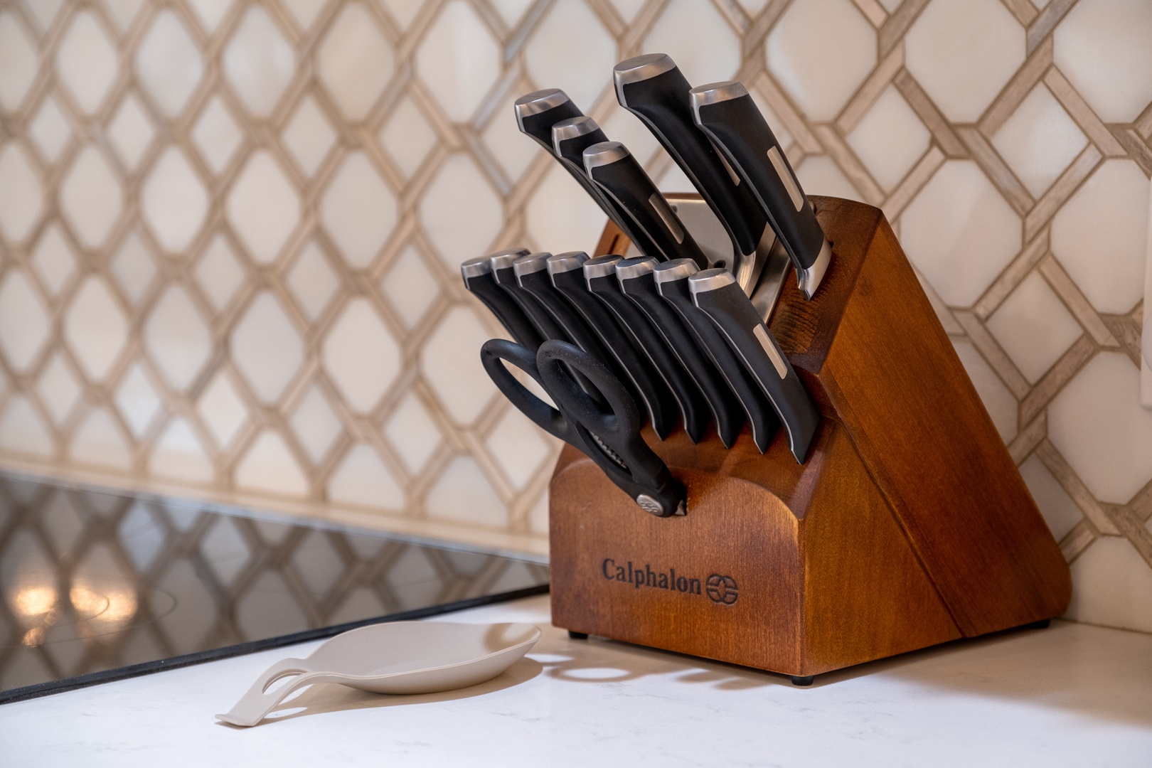 A fully-equipped knife block set stands ready on your counter, making meal preparation effortless during your stay.