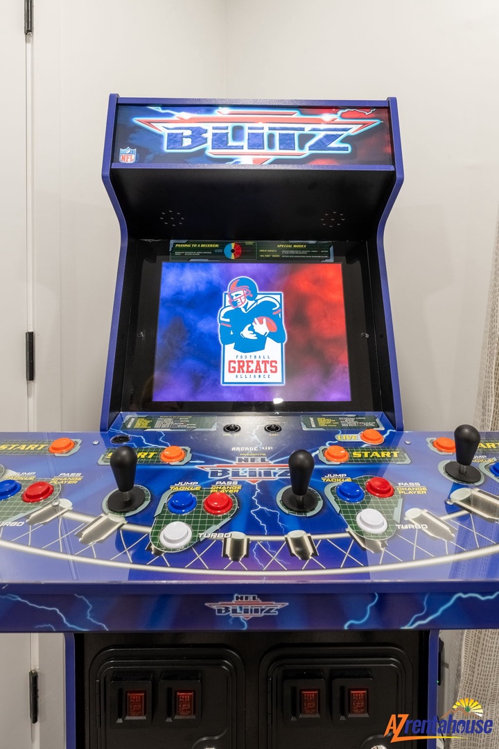Challenge friends to classic arcade games on this NFL Blitz machine, bringing nostalgic gaming fun to your stay.