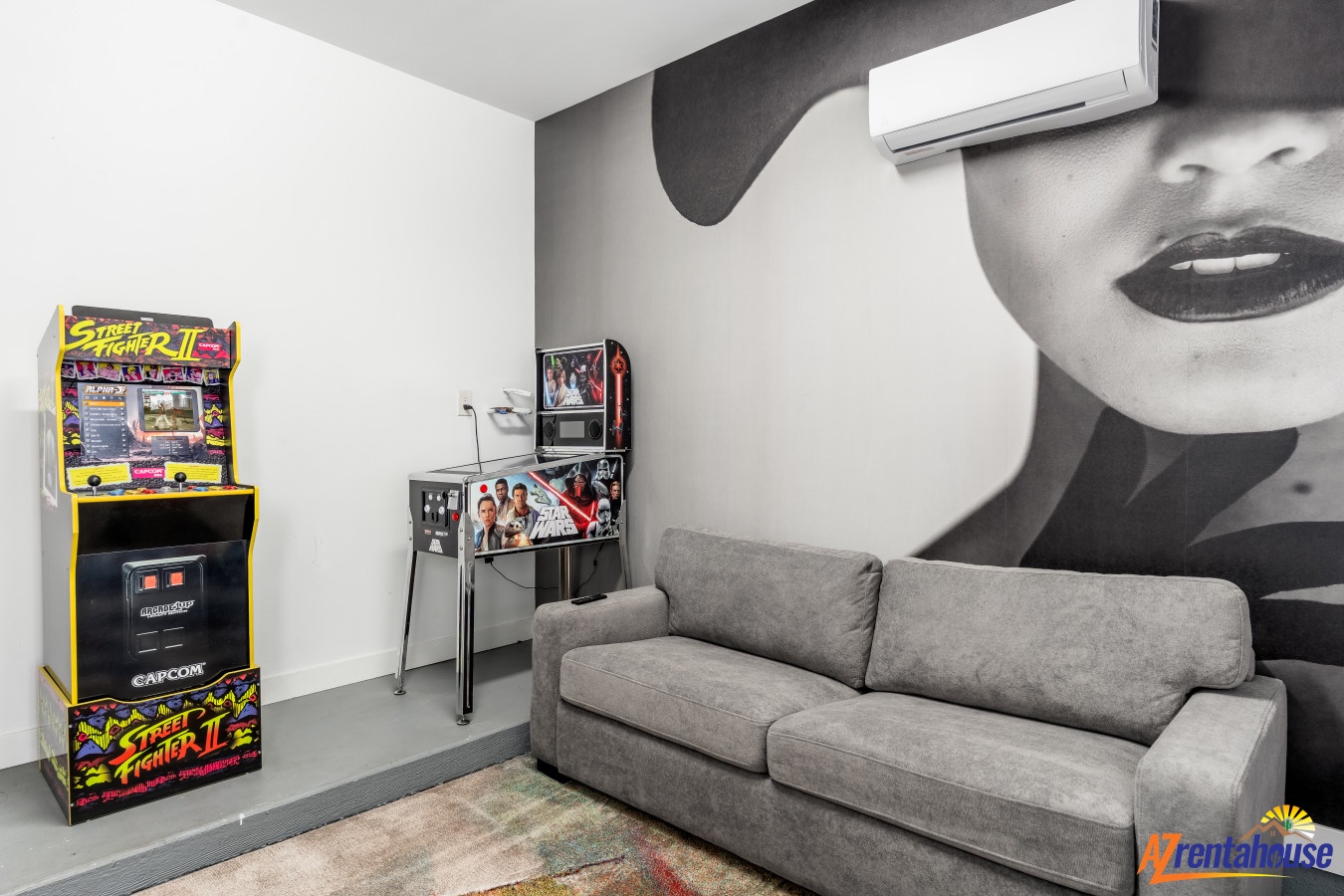 Relax on your plush sofa while mastering arcade classics or catching up on movies in this stylish entertainment lounge.