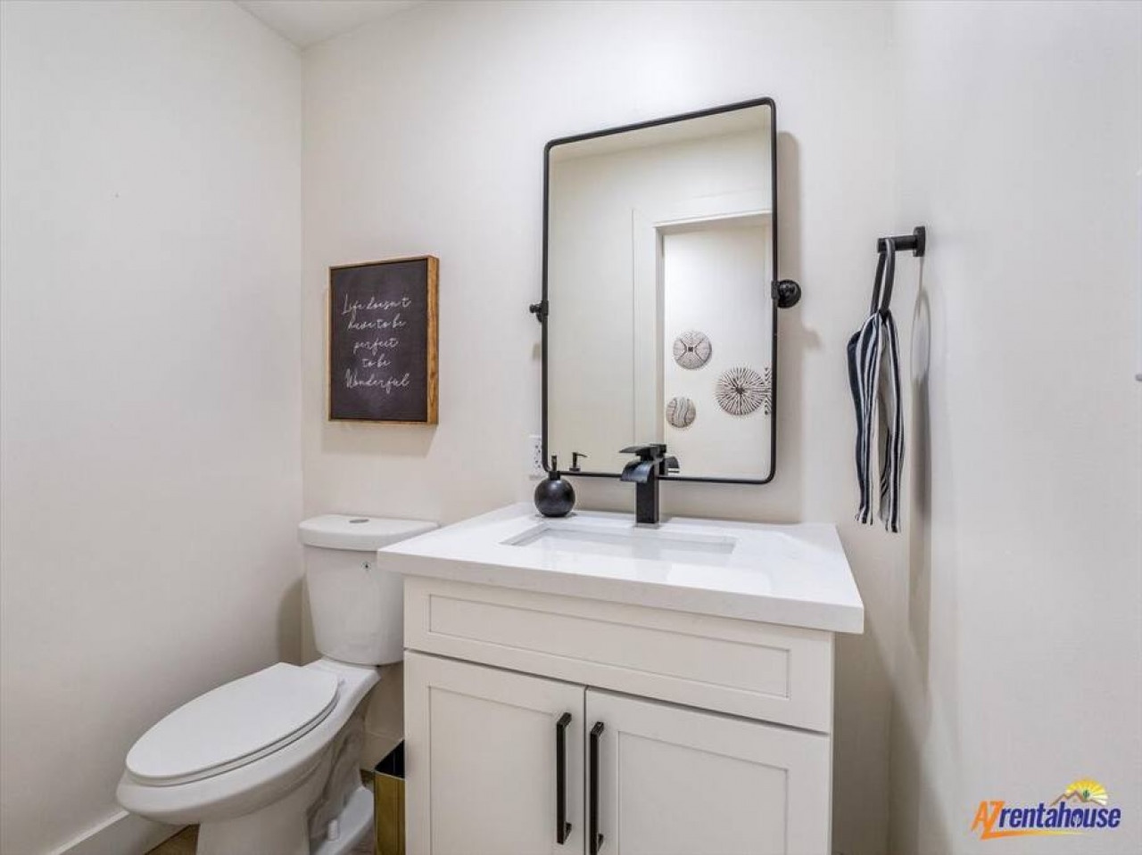 Step into your private powder room with marble counters, modern fixtures, and thoughtful touches that make freshening up feel luxurious.