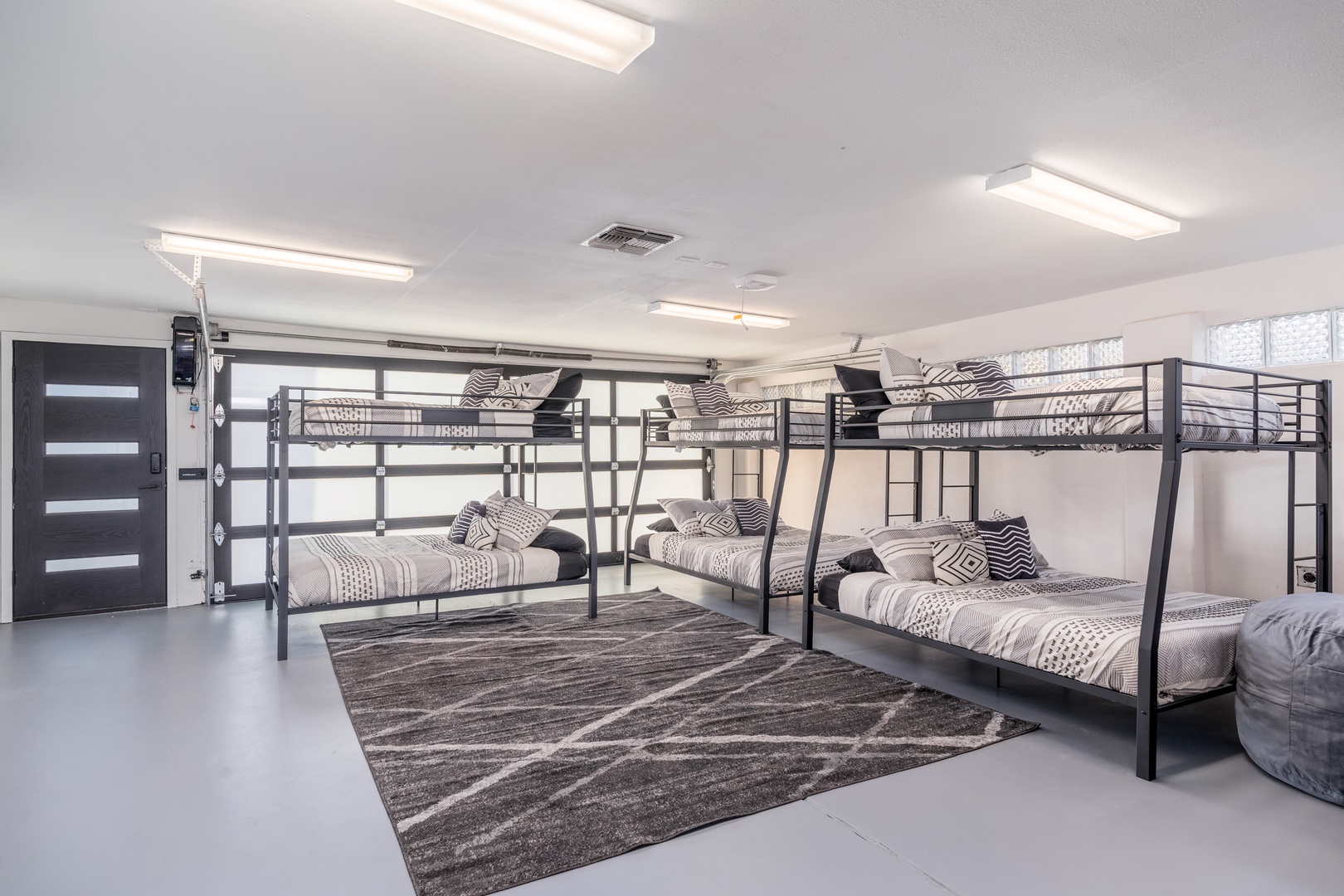 Spacious bunk room with comfortable bedding, perfect for families or groups traveling together—your home base for making memories with loved ones.