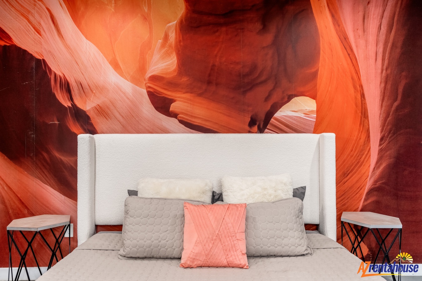 Drift off in your private bedroom, where dramatic canyon-inspired artwork creates a stunning focal point above your comfortable bed.