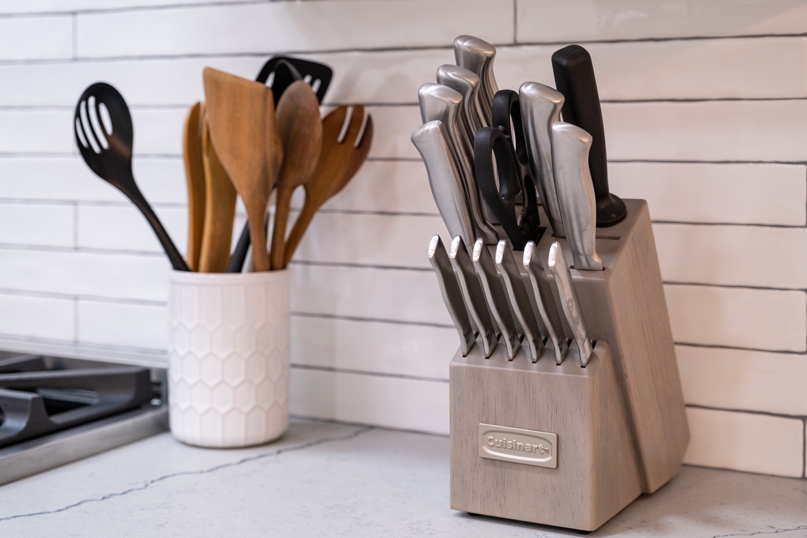 Your fully equipped kitchen features quality Cuisinart knives and stylish utensils, making meal prep effortless and enjoyable during your stay.