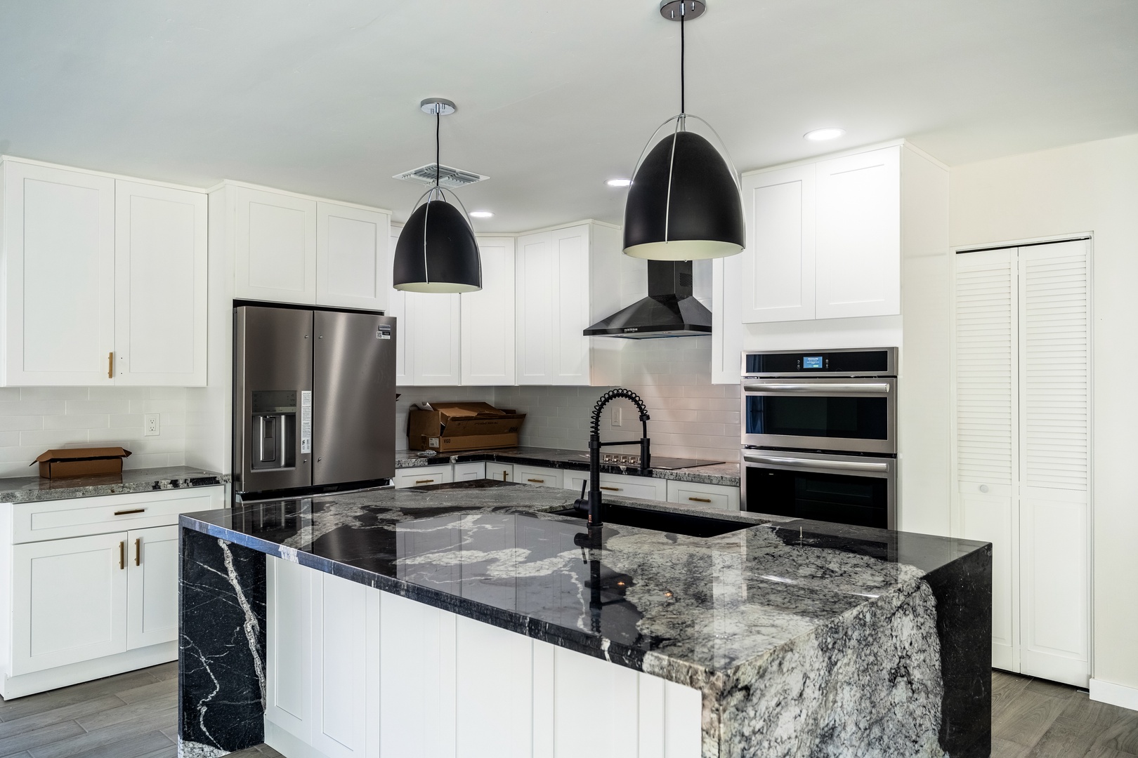 Your gourmet kitchen awaits with sleek granite countertops, stainless steel appliances, and ample prep space for crafting delicious meals during your stay.