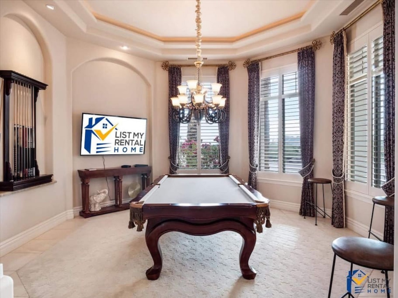 Challenge your friends to a game in this elegant billiards room, featuring rich wood details and sophisticated lighting.