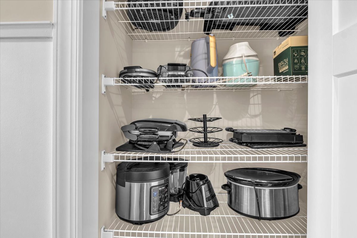 Your fully stocked kitchen pantry awaits with everything from slow cookers to skillets, making home-cooked meals effortless during your stay.