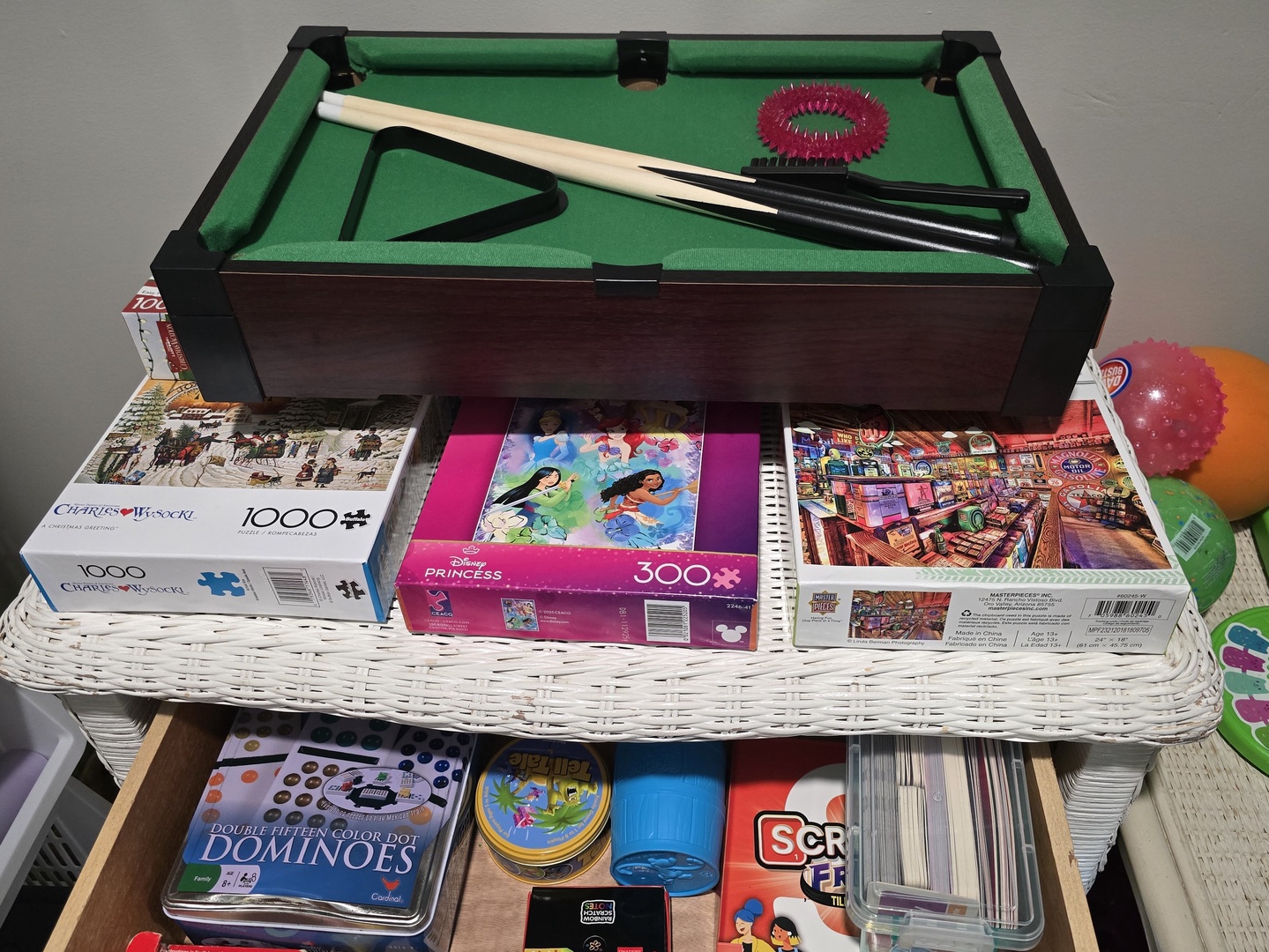 Enjoy game nights with the mini pool table, puzzles, and classic games perfectly arranged for your entertainment.