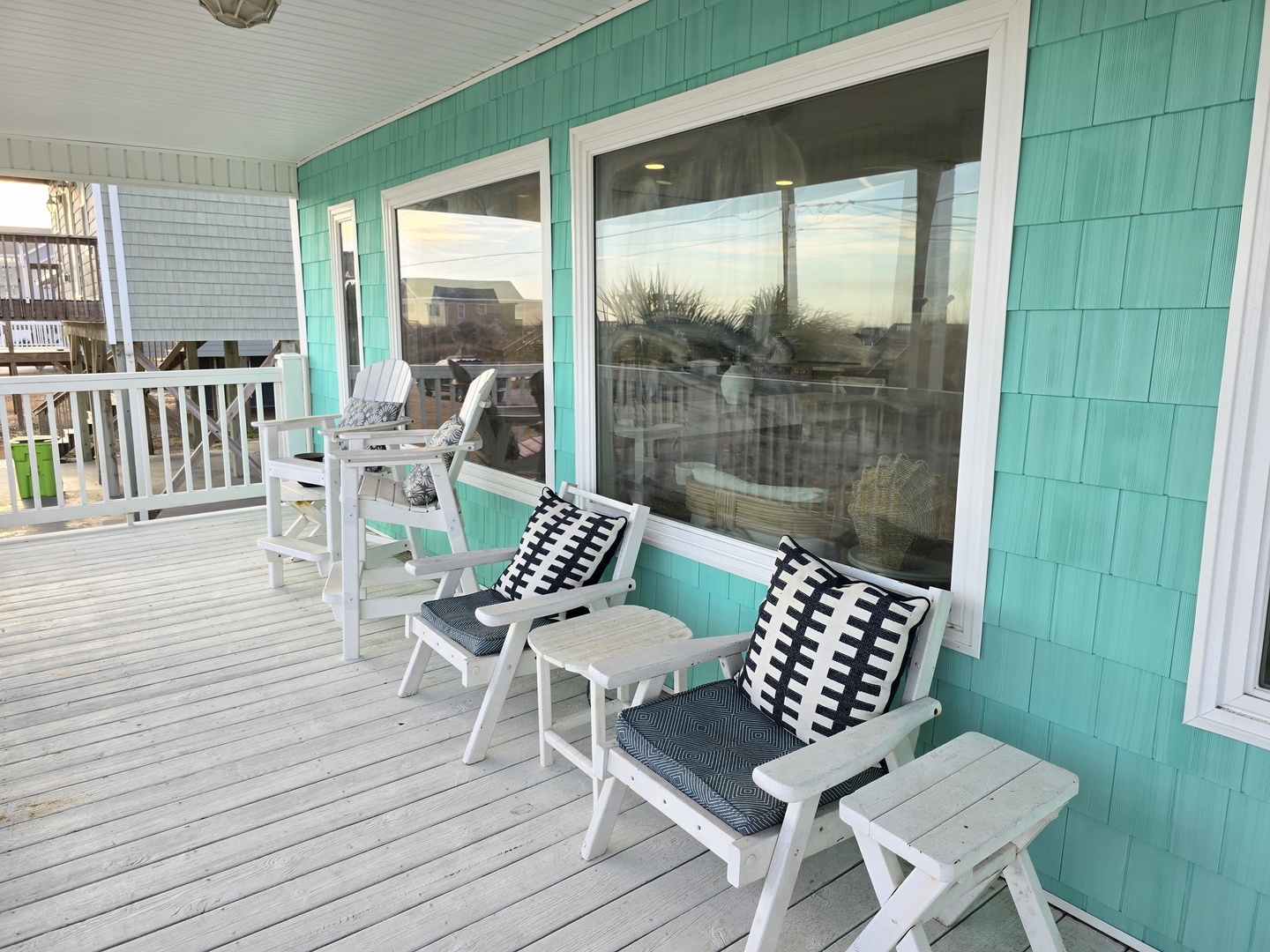 Relax on your private deck with comfortable seating and coastal views, perfect for morning coffee or evening unwinding.