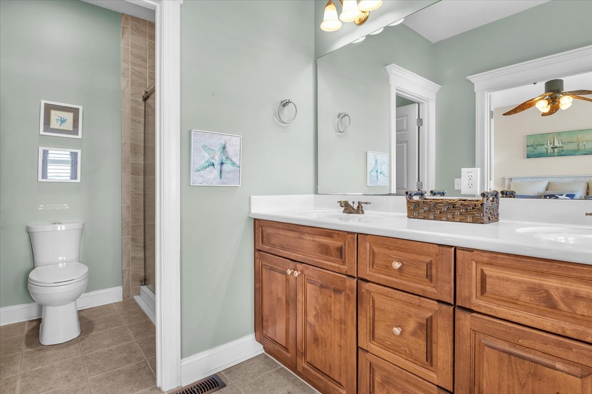 Bathroom 1: Ensuite with Tiled Shower - 1st Level