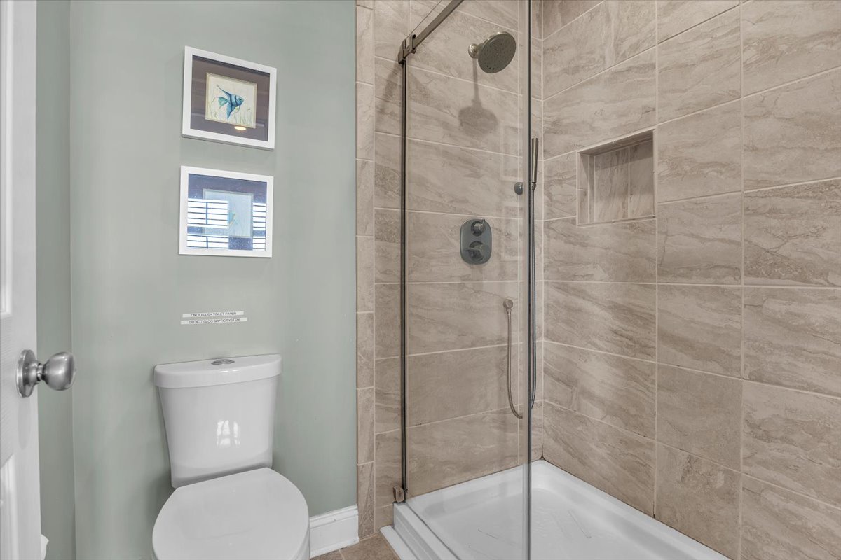 Bathroom 1: Ensuite with Tiled Shower - 1st Level