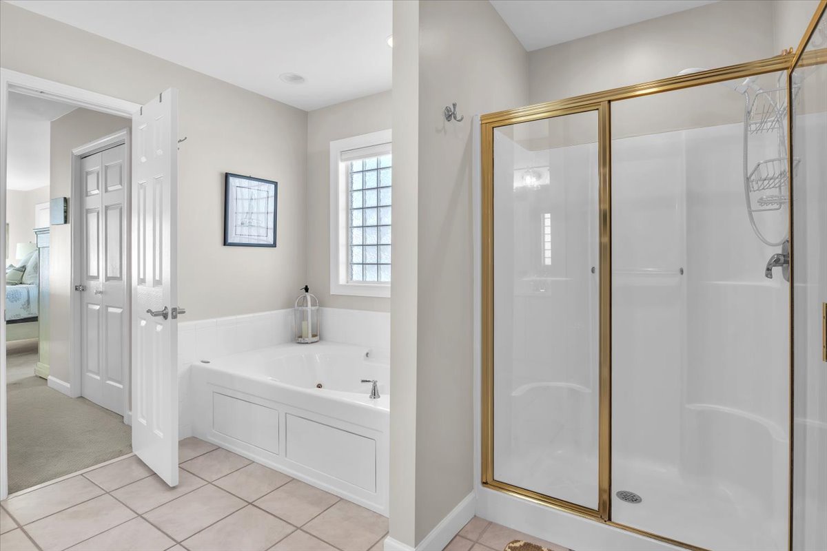 Bathroom 1: Ensuite with Shower - 1st Level