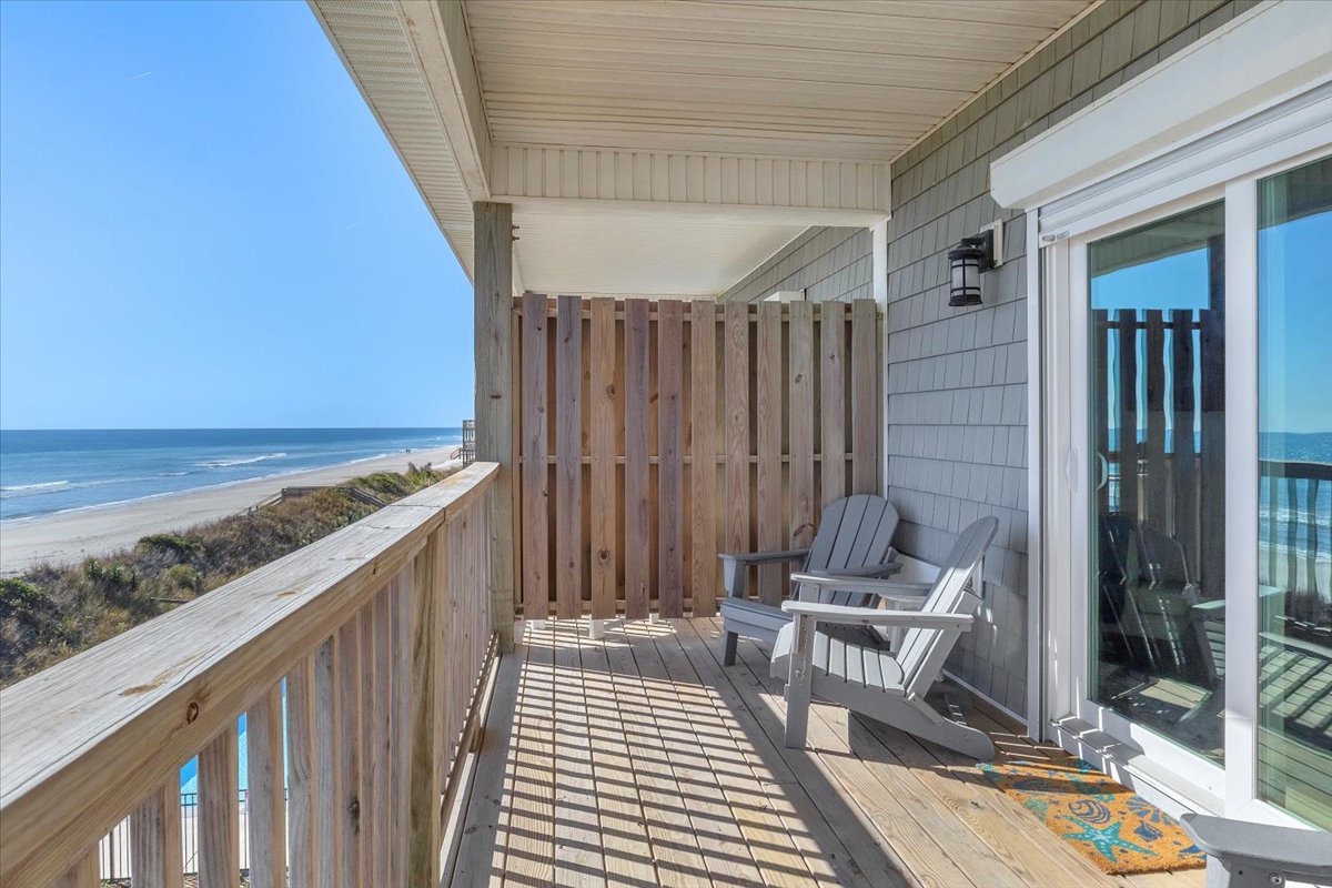 Unwind on your private oceanfront deck with breathtaking sea views stretching endlessly before you.