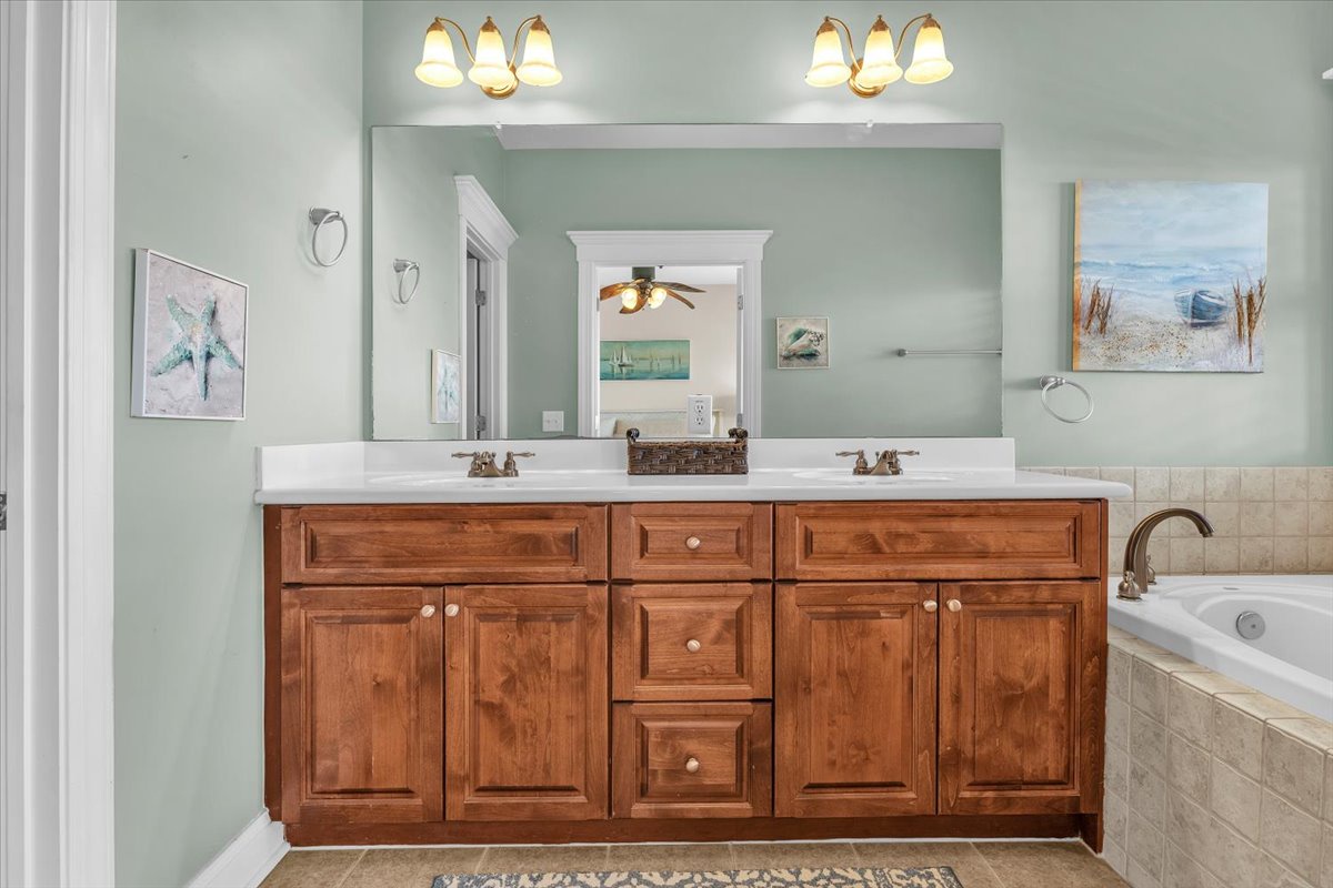 Bathroom 1: Ensuite with Dual Vanities - 1st Level