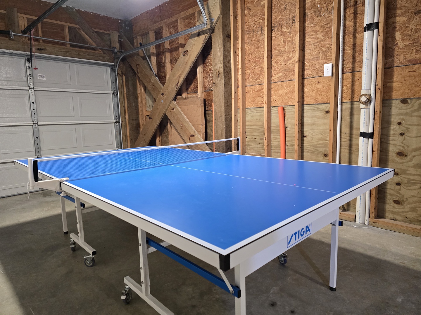 Challenge friends to ping pong matches in this spacious game area, where competitive fun awaits rain or shine.