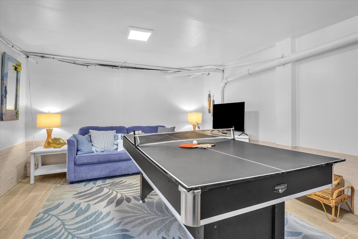 Challenge friends to ping-pong matches in your private game room, complete with cozy seating and TV for tournament breaks.