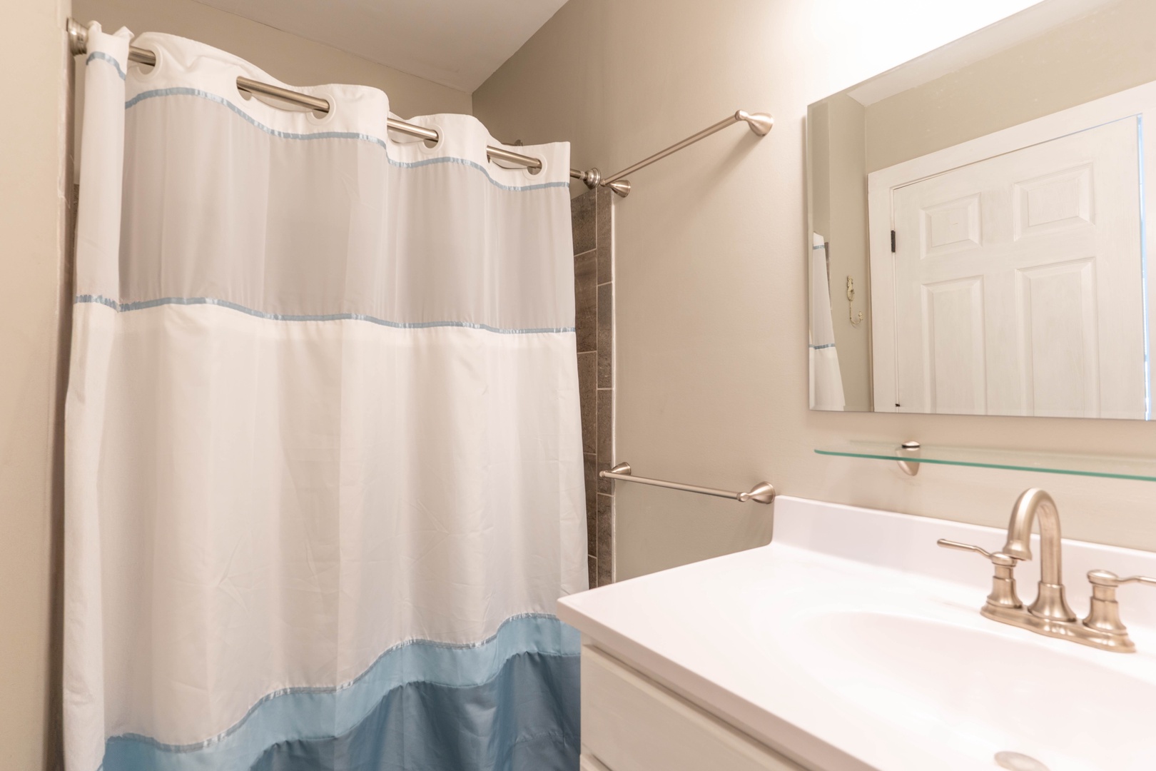 Bathroom1: Ensuite Bathroom with Tiled Shower - 1st Level